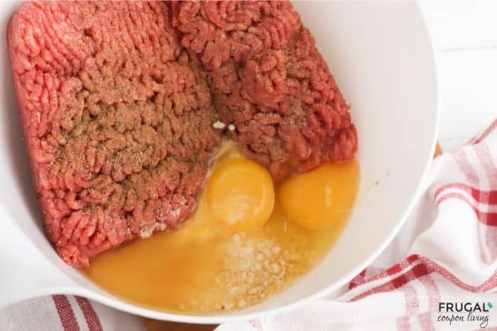 ground beef, eggs and seasoning in a bowl