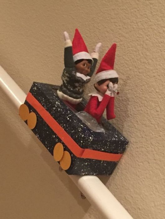 Elf on the Shelf Ideas with Boxes | Kleenex Box Sled on the Stairs