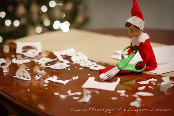 Messy Elf on the Shelf Paper Snowflakes